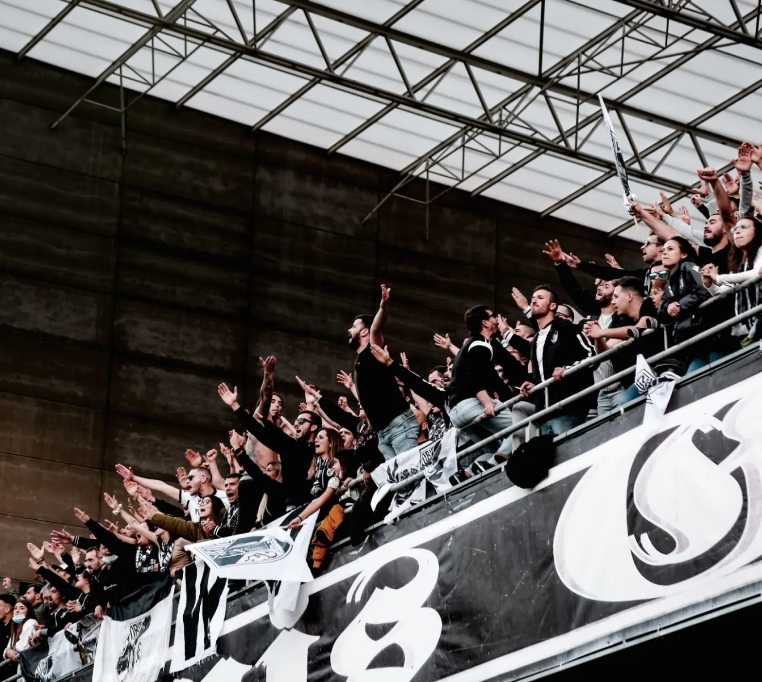 Fans in a stadium stand